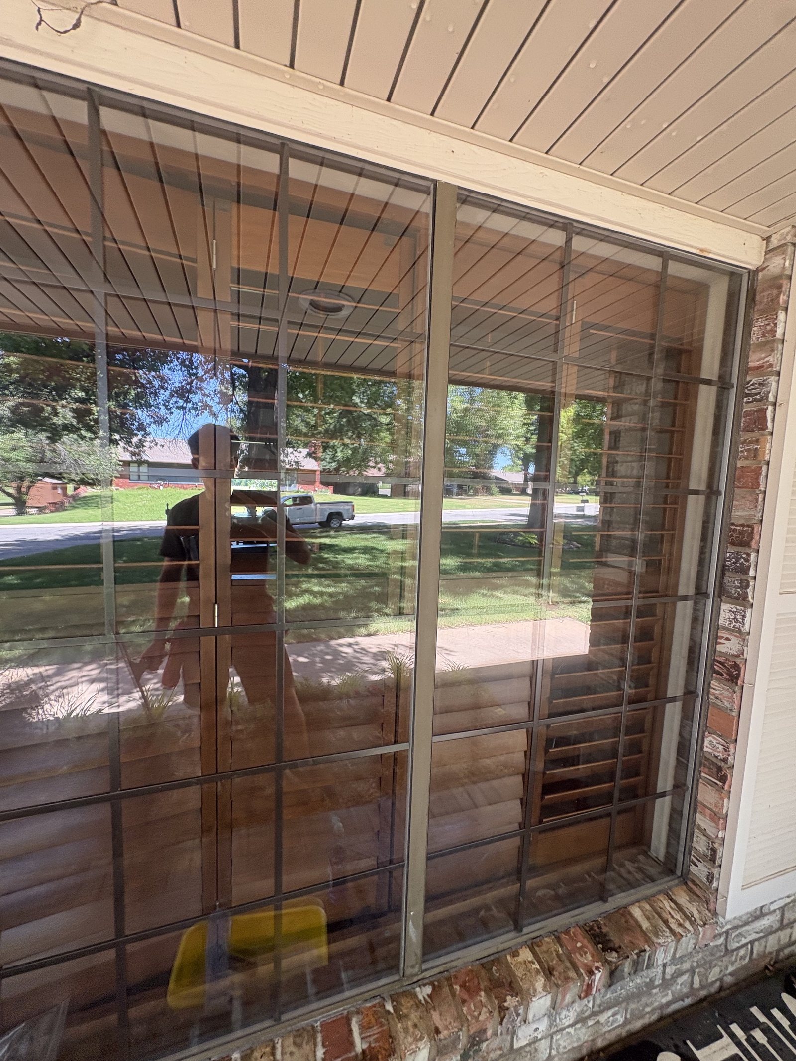 A cleaned sliding patio door and side panels