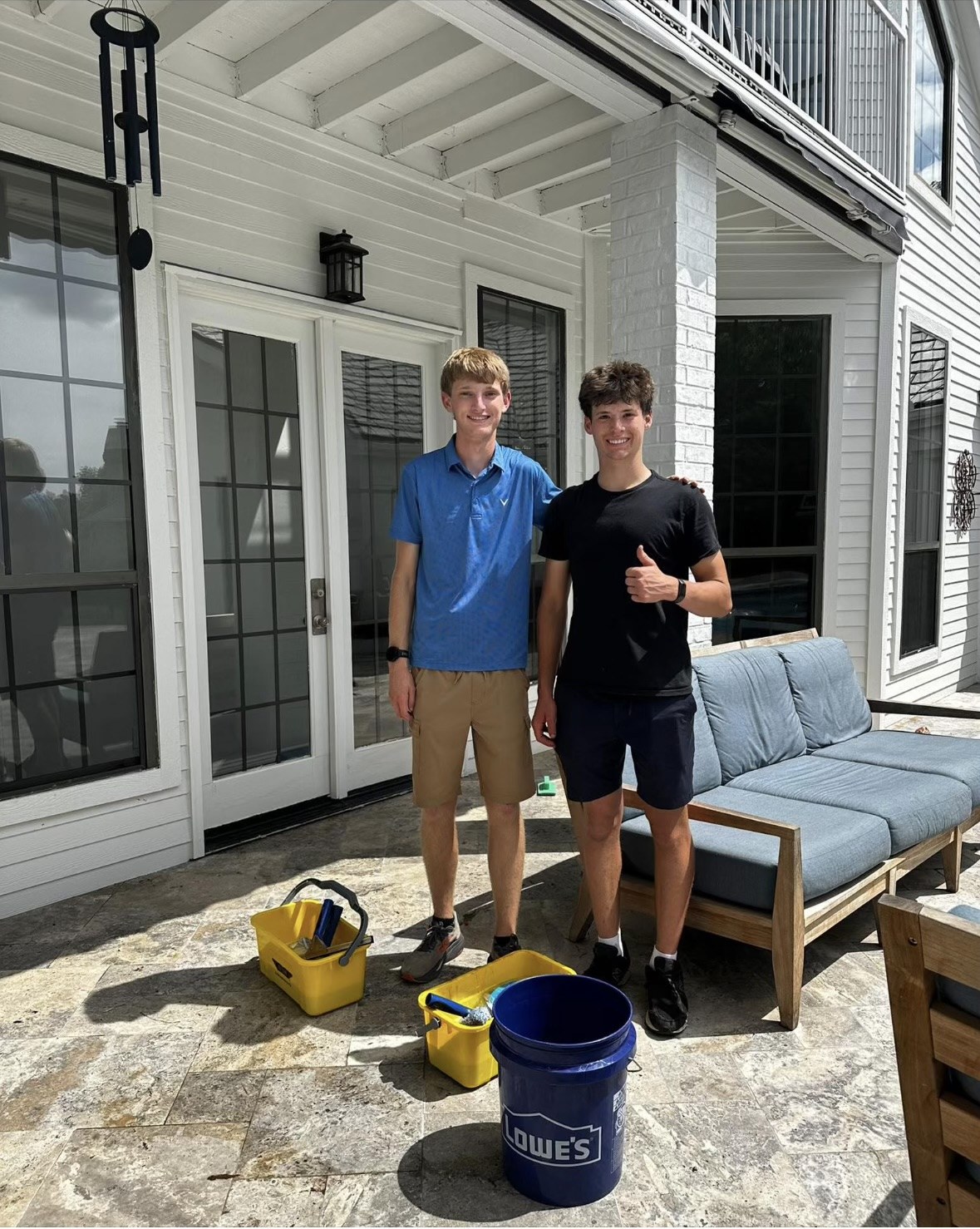 The two of us on a customer's back patio with our buckets